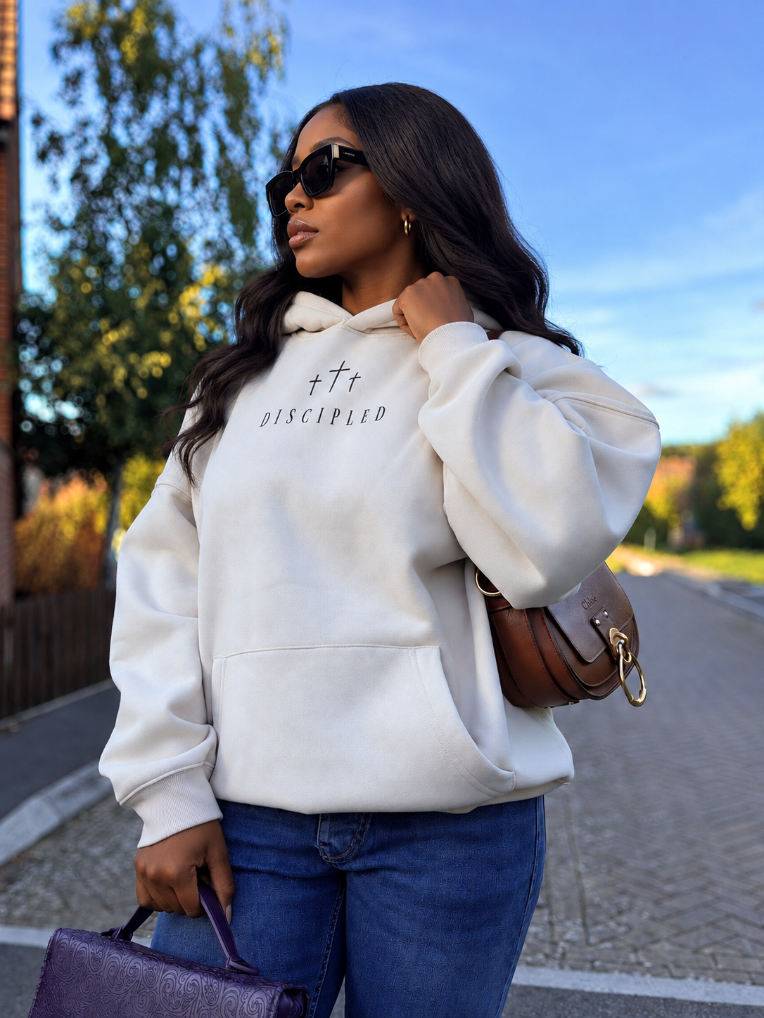Discipled hoodie with the chest logo in focus